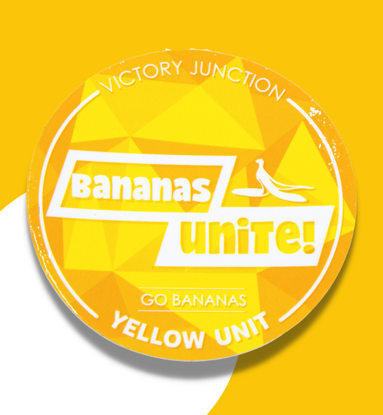 Yellow sticker that reads "Victory Junction" at the top. In the middle it reads "Bananas Unite. Go Bananas." At the bottom it reads "Yellow Unit."